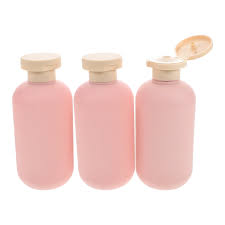 Refillable 3 pcs pink lotion/shampoo bottles